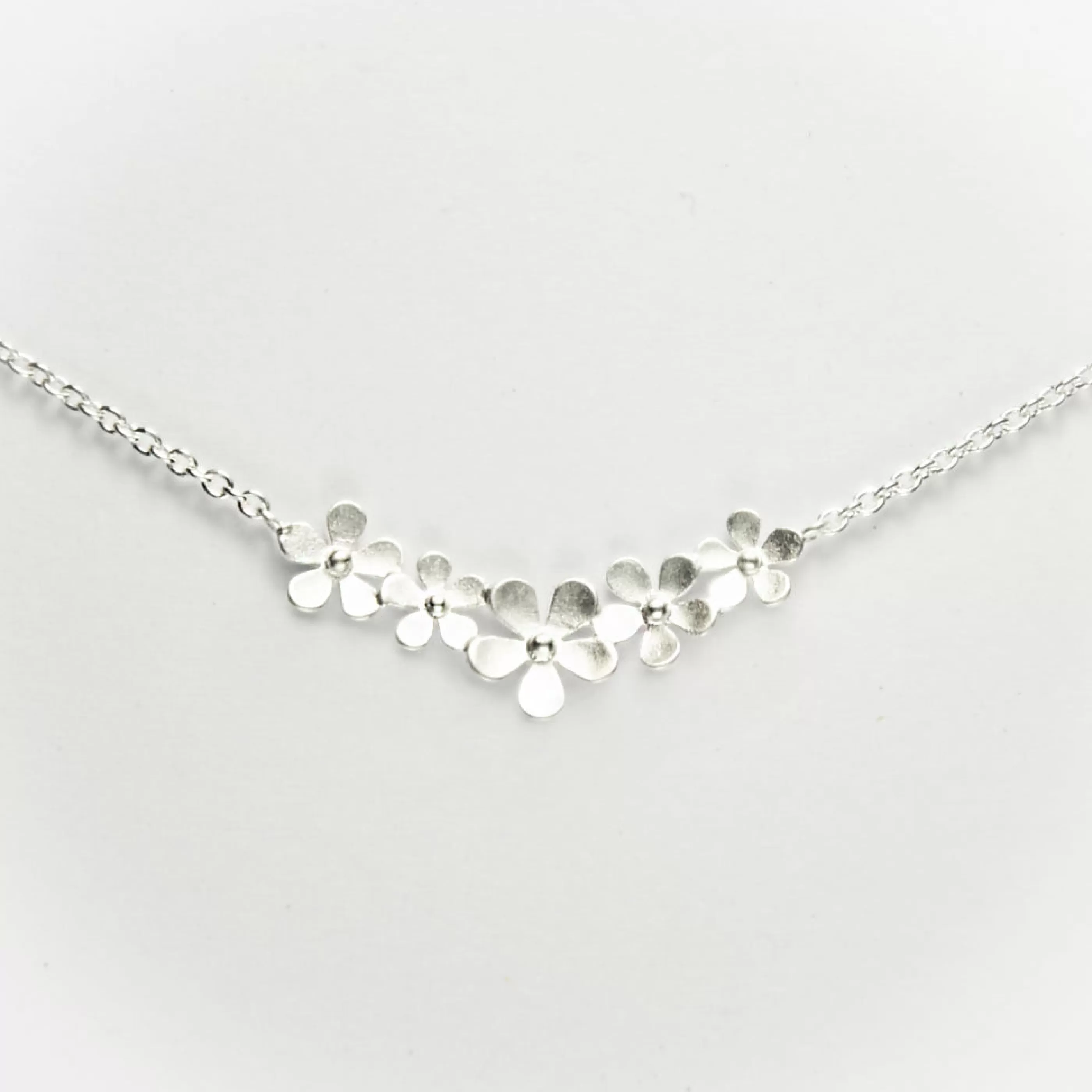 Tashi Jewellery>Curve Of Flowers Necklace Brushed Sterling Silver